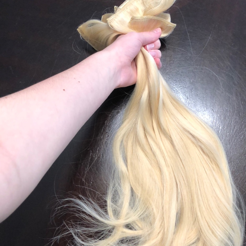 Clip in human hair extensions